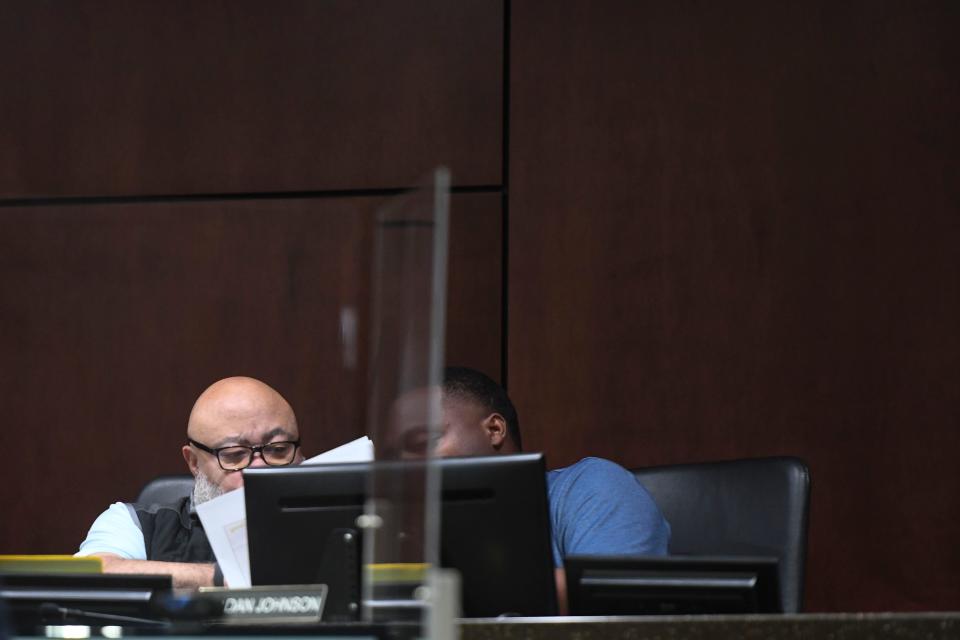 Commissioners Bobby Williams (left) and Jordan Johnson (right) look at the proposed budget at the Augusta commission budget workshop in the Augusta-Richmond County Municipal Building on Thursday, Oct. 26, 2023.