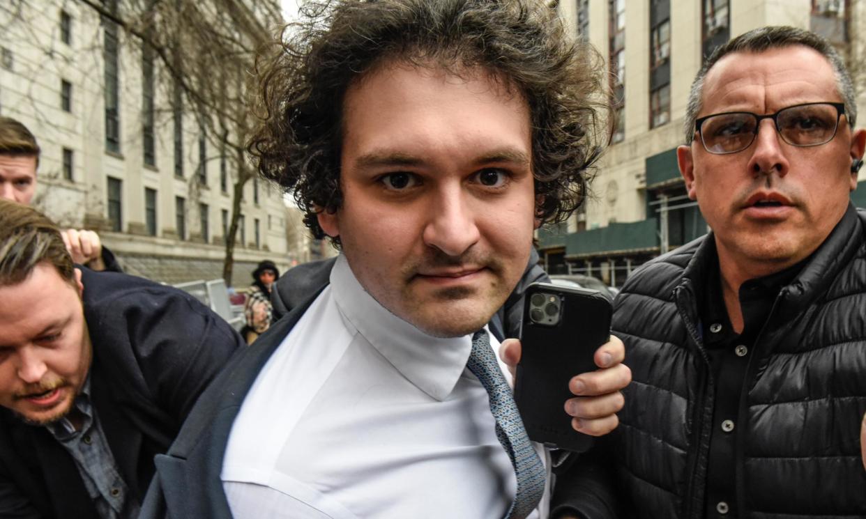 <span>Sam Bankman-Fried, co-founder of FTX, departs from court in New York, on 16 February 2023.</span><span>Photograph: Bloomberg/Getty Images</span>