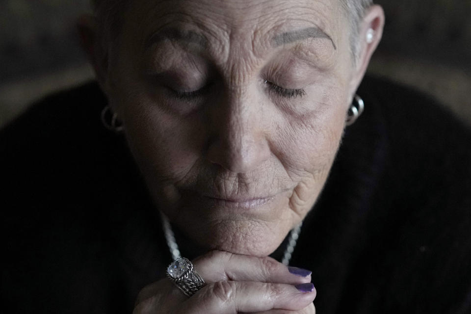 Deb Robertson sits for a portrait at her Lombard, Ill. home, Thursday, March 21, 2024. She didn’t cry when she learned two months ago that the cancerous tumors in her liver were spreading, portending a tormented death. But later, she cried after receiving a call that a bill moving through the Illinois Legislature to allow certain terminally ill patients to end their own lives with a doctor’s help had made progress. (AP Photo/Charles Rex Arbogast)