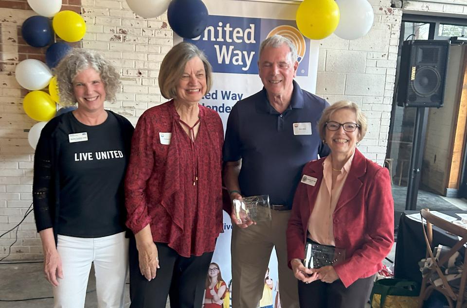 Denise Cumbee Long, left, posed with 2023 Distinguished Award recipients (from left) Barbara Platz, Dave Witte accepting for Jan Witte and Barbara Volk at the United Way celebration event on Sept. 26.