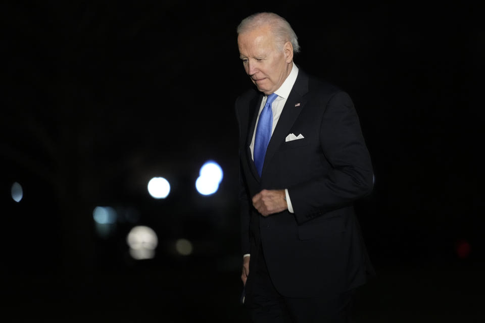 President Joe Biden walks across the South Lawn of the White House in Washington, Wednesday, Feb 22, 2023, after returning from his trip to Ukraine and Poland. (AP Photo/Susan Walsh)