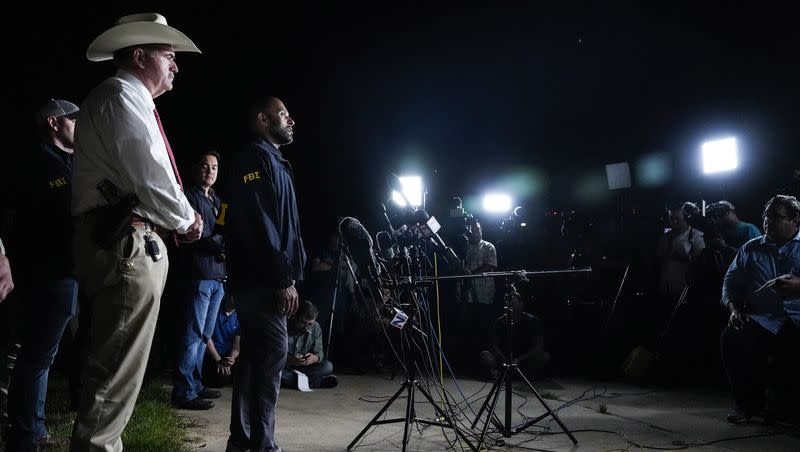 San Jacinto County Sheriff Greg Capers, left, and FBI assistant Special Agent in Charge Jimmy Paul speak to the media during a news conference announcing the arrest of murder suspect Francisco Oropeza on Tuesday, May 2, 2023 in Cleveland, Texas. Law enforcement officials captured Oropeza without incident on Tuesday night at a home near Houston, ending a four-day manhunt for a suspect who police believe fled after a mass shooting that left five dead.