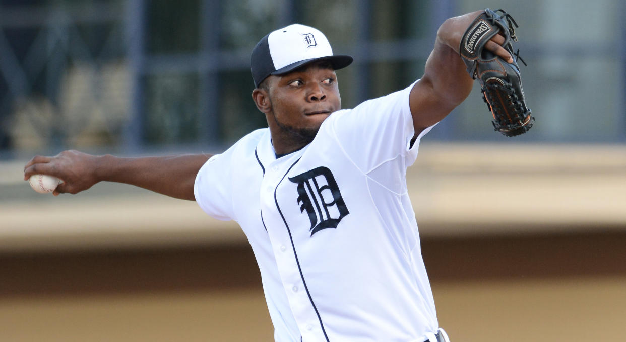 LAKELAND, FL - MARCH 03:  Rafael Dolis #67 of the Detroit Tigers pitches during the Spring Training game against the Baltimore Orioles at Joker Marchant Stadium on March 3, 2015 in Lakeland, Florida. The Tigers defeated the Orioles 15-2.  (Photo by Mark Cunningham/MLB Photos via Getty Images)