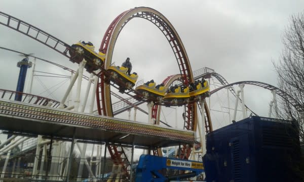 Firefighters rescue eight people stuck on broken rollercoaster