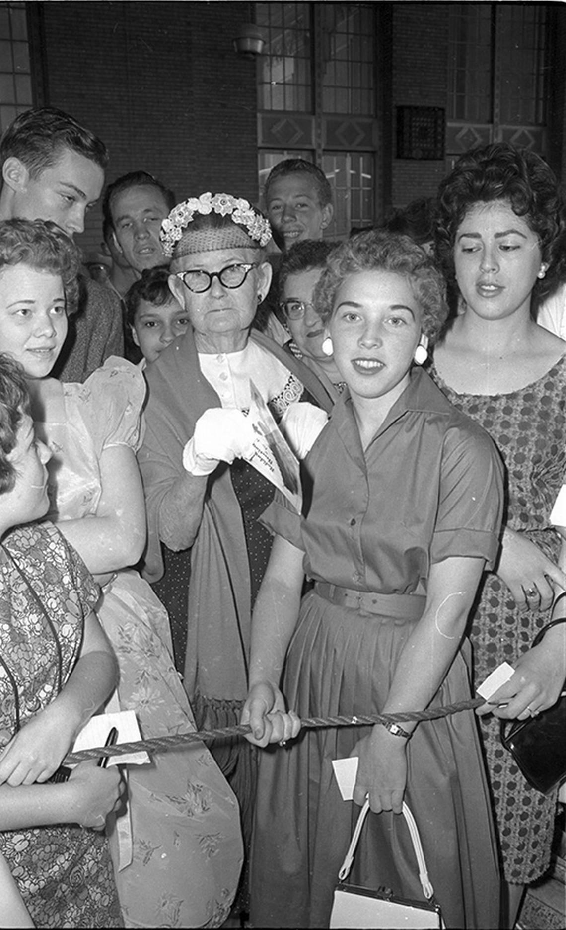 April 19, 1960: Fans wait to see Elvis at the T&P train station in Fort Worth during his layover en route to Hollywood to film “GI Blues.”