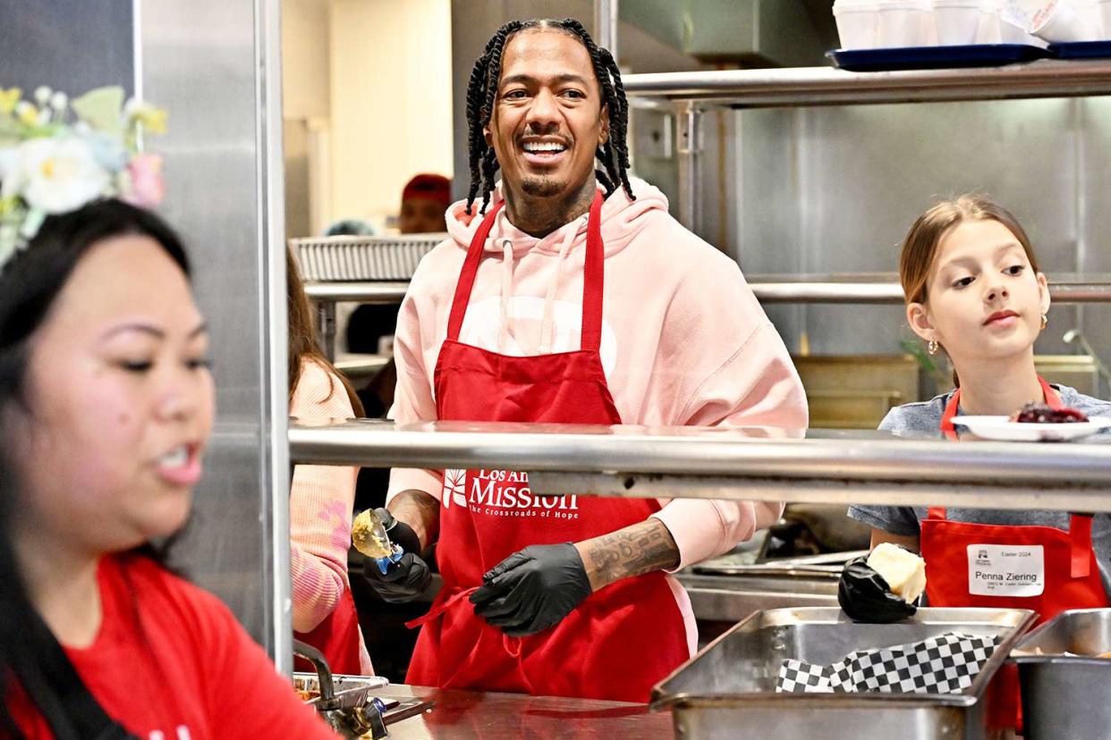 <p>Rob Latour/Shutterstock </p> Nick Cannon at Los Angeles Mission to Serve Up Easter Meals for the Skids Row Community