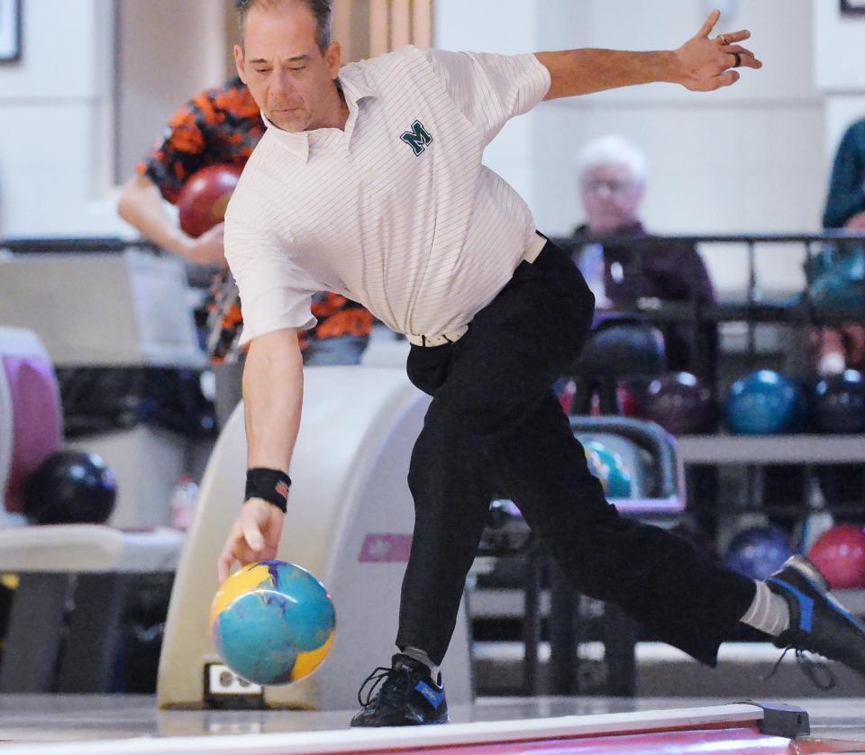 Michael Machuga warms up before the 61st annual Times-News Open bowling tournament final round at Eastland Bowl in Erie on Saturday. Machuga placed second with a match-play best record of 13-3.