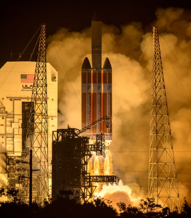 Photo released by NASA shows the United Launch Alliance Delta IV Heavy rocket with the Parker Solar Probe aboard launching from the Mobile Service Tower at Launch Complex 37, Cape Canaveral Air Force Station in Florida on August 12, 2018