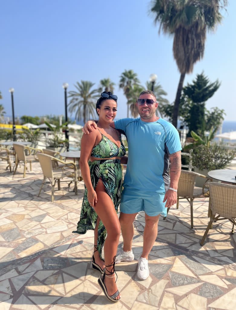 “Why go on holiday and worry about the food when I can take it with me?” rationalized John Phillips, 40, pictured here with wife Rebecca. Kennedy News and Media