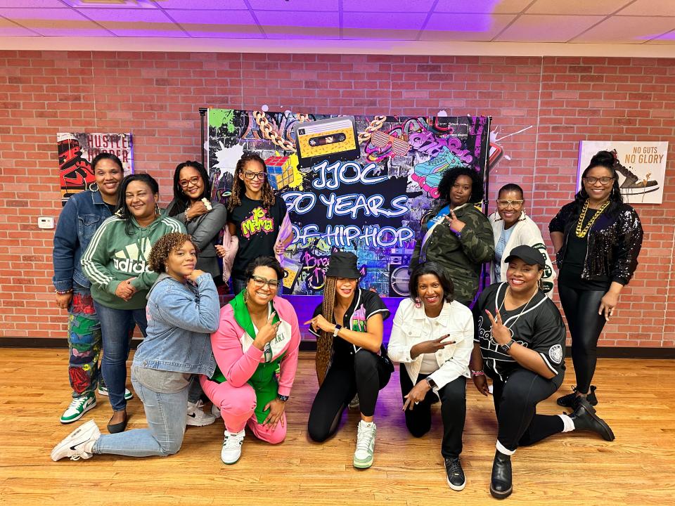 The Oakland County Chapter of Jack and Jill of America, Inc. mother members pose at their Oct. 2023 educational event on hip-hop culture.