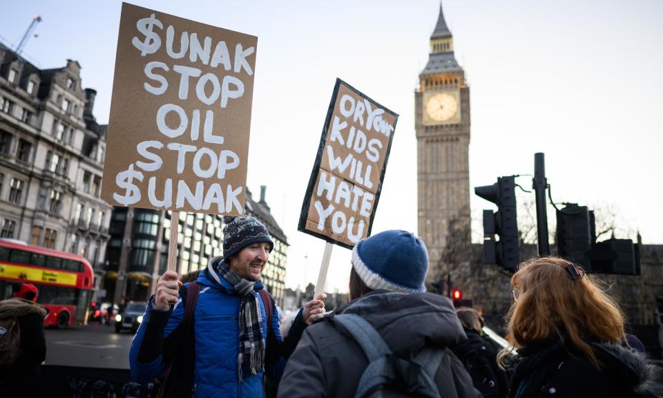 <span>Just Stop Oil campaigners protesting against the offshore licensing bill in Parliament Square in January.</span><span>Photograph: Leon Neal/Getty Images</span>