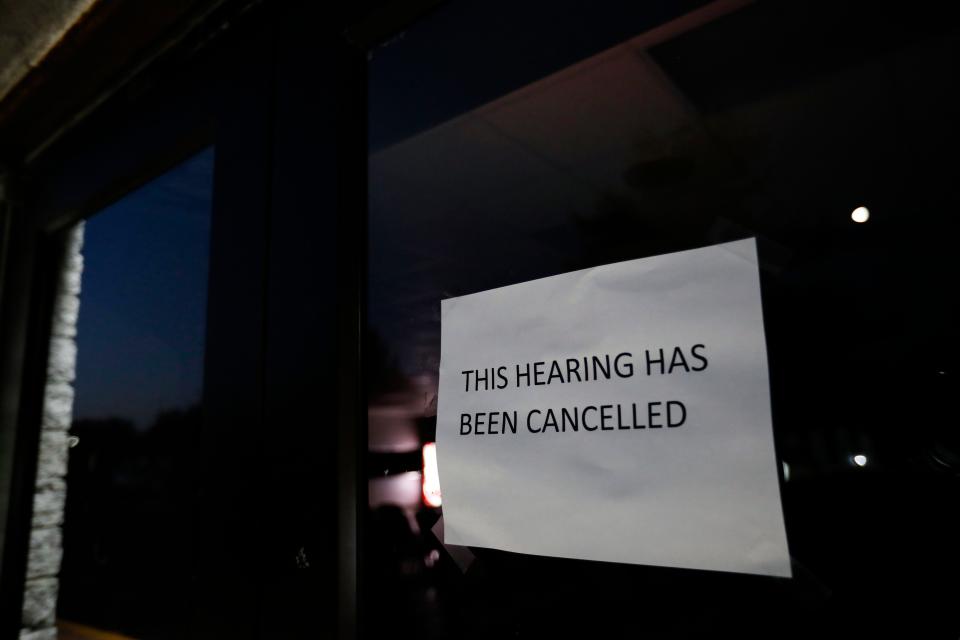A sign on the door of the Willard Community Center on Thursday, Oct. 26, 2023 notifying people the impeachment hearing for Mayor Sam Snider is canceled. Snider announced his resignation three hours before the hearing was scheduled to take place.