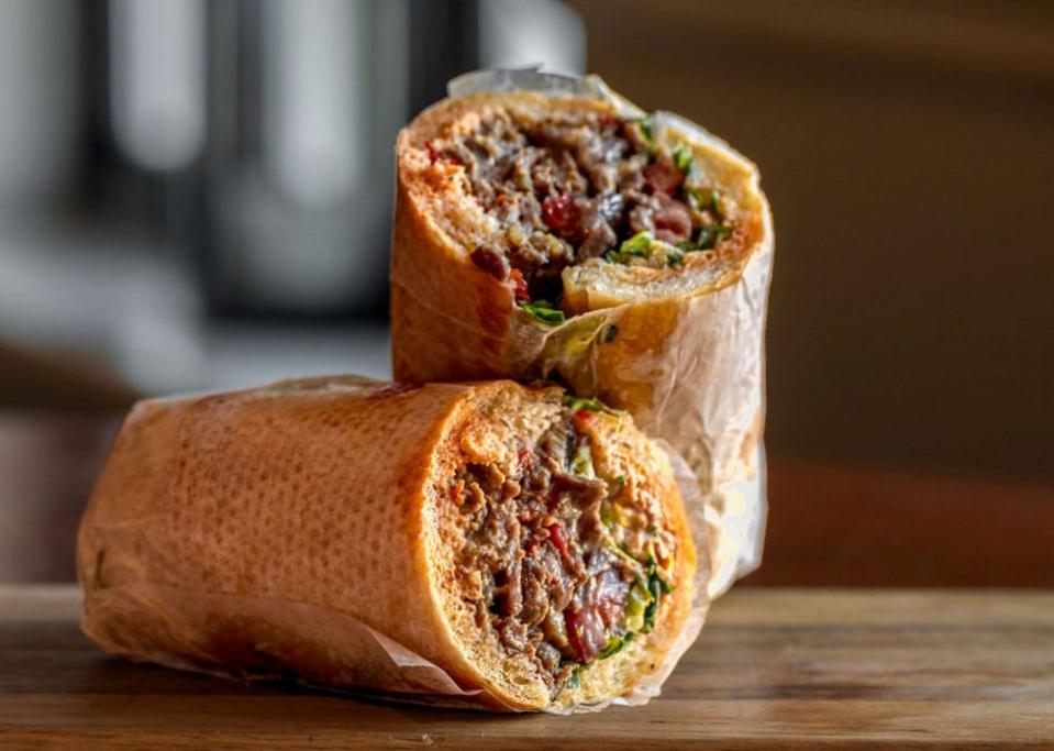 A "Steak Bomb" sandwich is served at Palm Beach's Buccan Sandwich Shop, which added a West Palm Beach location in March 2023.