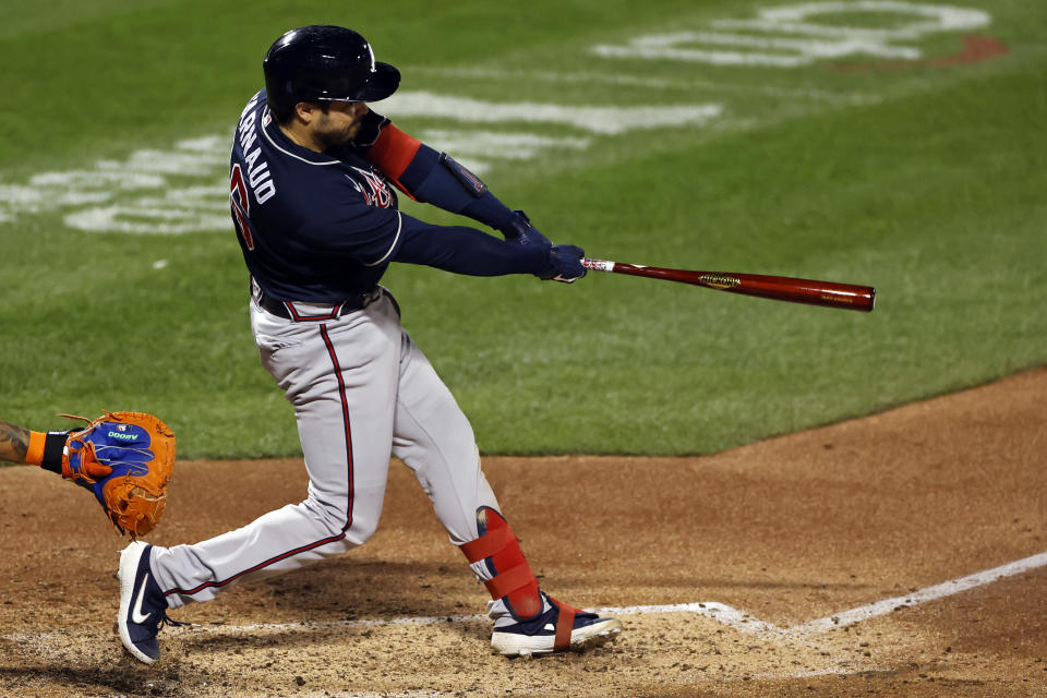 Atlanta Braves' Travis d'Arnaud hits a two-run home run during the fourth inning of a baseball game against the New York Mets, Friday, Sept. 18, 2020, in New York. (AP Photo/Adam Hunger)