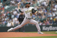 Oakland Athletics starting pitcher Paul Blackburn throws against the Seattle Mariners during the first inning of a baseball game, Saturday, July 2, 2022, in Seattle. (AP Photo/Ted S. Warren)