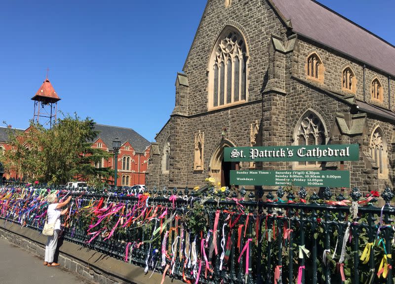 FILE PHOTO: Resident puts a ribbon on the fence of St Patrick's Cathedral in Ballarat