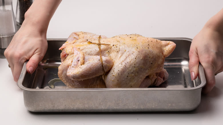 roasting chicken in roasting tray