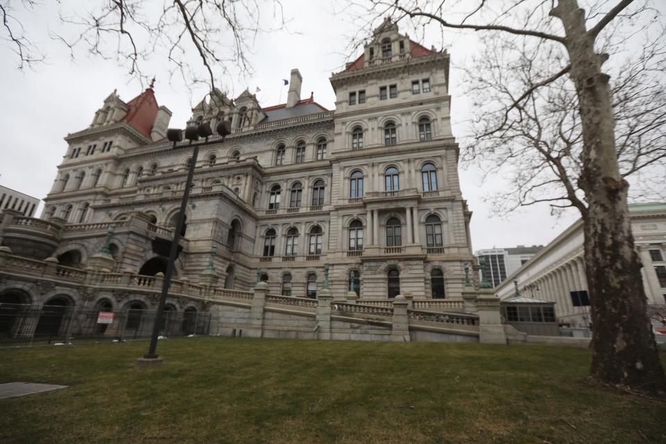 Lawmakers at the New York state Capitol protest the governor's attempts to keep a hand in the investigation into allegations against him.