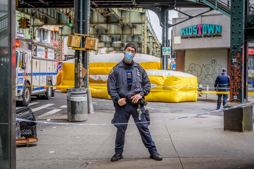 BROOKLYN, NEW YORK, UNITED STATES - 2020/04/29: NYPD officer wearing a protective mask on April 29, 2020. (Photo by Erik McGregor/LightRocket via Getty Images)