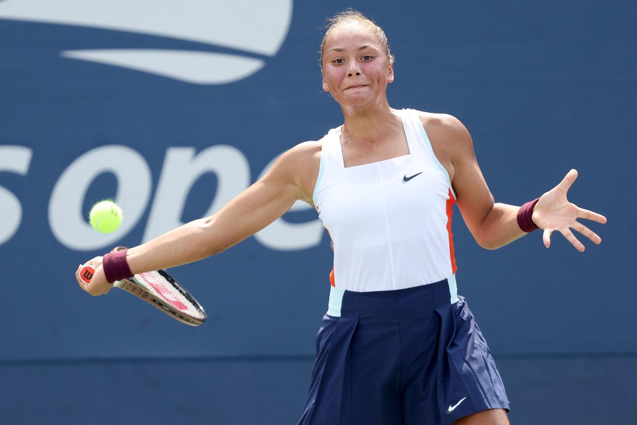 Sofia Costoulas of Belgium returns a shot against Lucciana Perez Alarcon of Peru during their Junior Girl's Singles First Round match on Day Seven of the 2022 U.S. Open at USTA Billie Jean King National Tennis Center on Sept. 4, 2022, in Flushing, Queens.