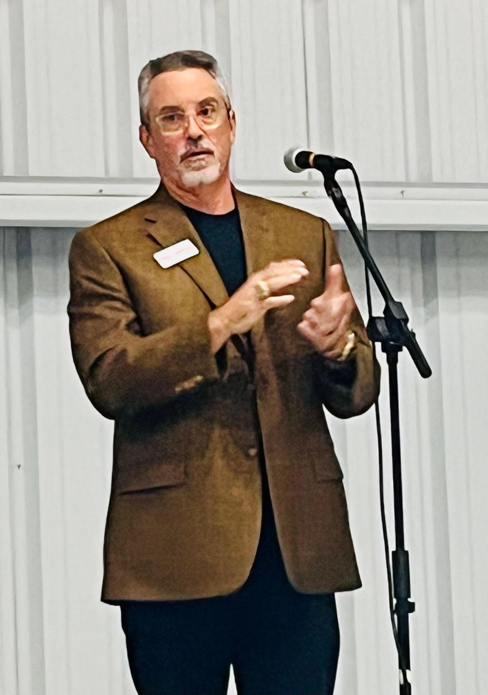 Candidate for Naples City Council Tony Perez-Benitoa speaks to a group about the importance of the Naples Airport at a private event Feb. 28, 2024, hosted by Elite Jets in a hangar at the airport.