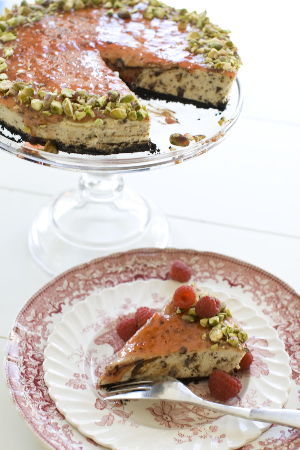 This Nov. 11, 2013 photo shows red currant and chocolate cheesecake in Concord, N.H. In this recipe, chopped chocolate is a distinct, toothsome confetti strewn throughout the cake. (AP Photo/Matthew Mead)