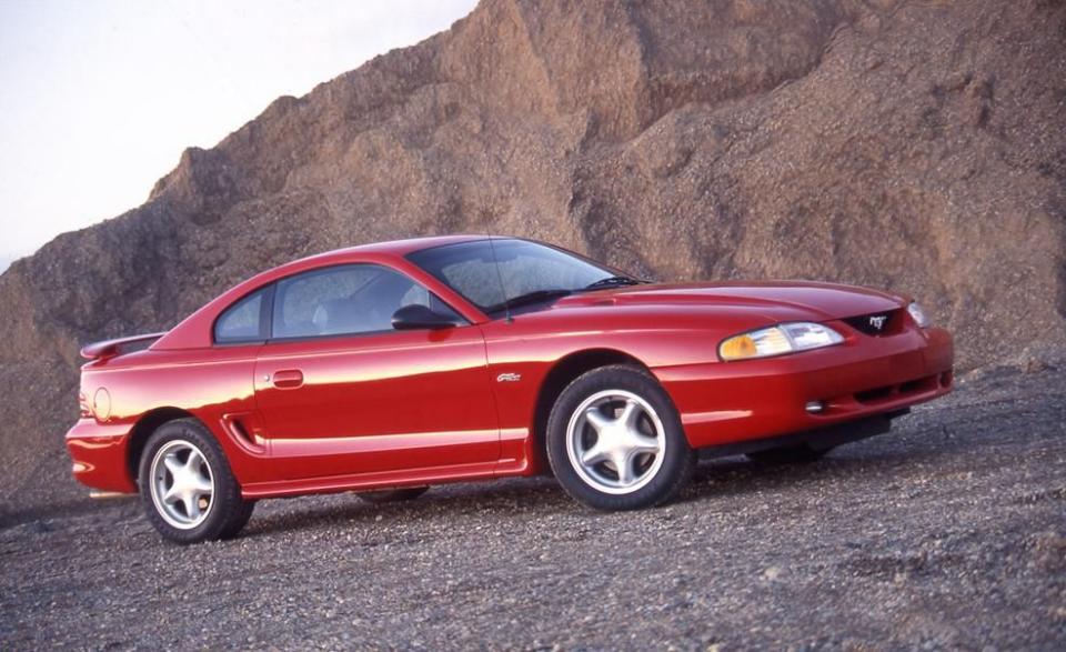 <p>Now that the year-old redesign of the Ford Mustang has some miles on it, both Ford and the Mustang’s obsessed clientele are ready for a few important changes. A Mustang Cobra making more than 300 horsepower is certainly welcome. And finally banished from the ’96 Mustang GT is the ancient overhead-valve 4.9-liter V-8, which-in various guises-has powered Mustangs since their inception. Certain purists may wail and gnash their teeth over this one, but it’s a transition we like. <a rel="nofollow noopener" href="http://www.caranddriver.com/reviews/1996-ford-mustang-gt-archived-instrumented-test-review" target="_blank" data-ylk="slk:READ MORE>>;elm:context_link;itc:0;sec:content-canvas" class="link ">READ MORE>></a></p>