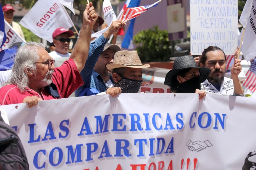 Immigration rights activists take part in pro immigration rally on the steps of Pershing Square in Downtown Los Angeles on Thursday, June 9, 2022. About a hundred activists from different immigration rights groups, took part in immigration reform rally walking to the Los Angeles Convention Center from Pershing Square to protest the Summit of Americas. (Photo by James Carbone)