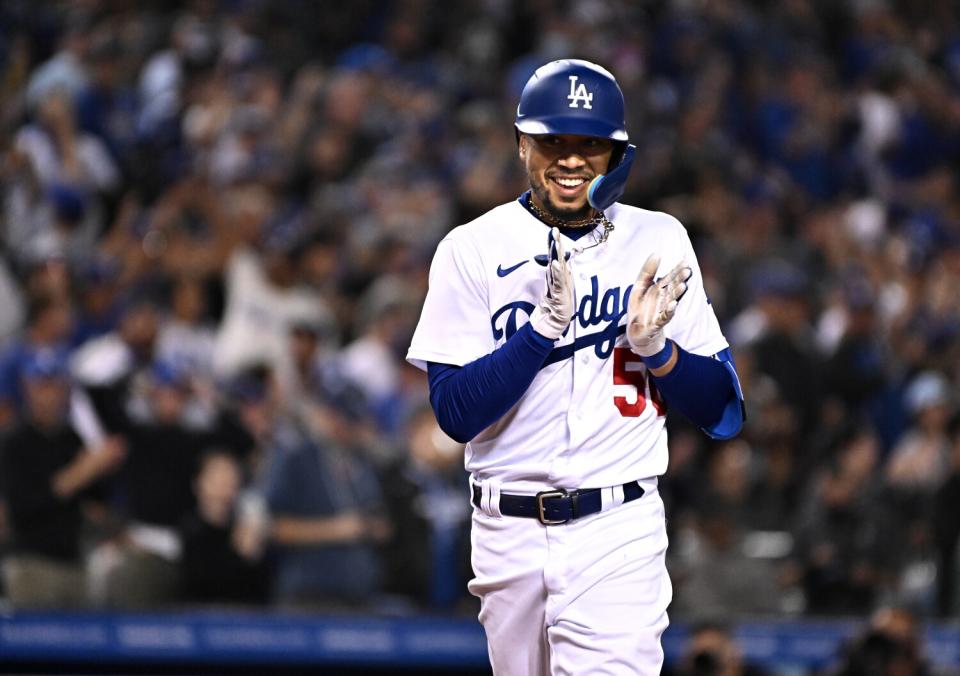 Mookie Betts celebrates after hitting a home run against the San Francisco Giants on May 4 at Dodger Stadium.