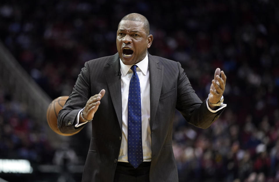 LA Clippers coach Doc Rivers yells at his players during the first half of an NBA basketball game against the Houston Rockets Wednesday, Nov. 13, 2019, in Houston. (AP Photo/David J. Phillip)