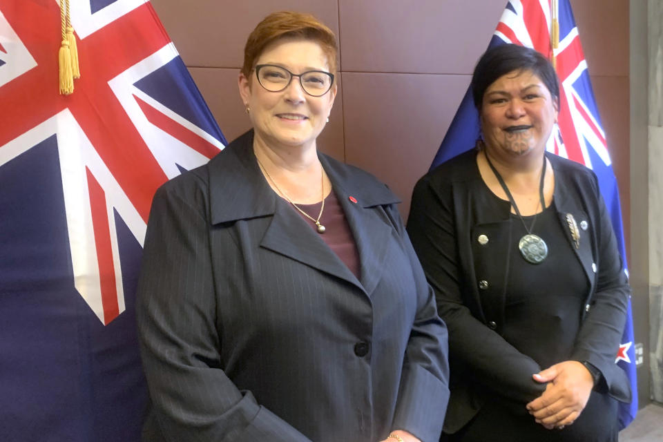 Australian Foreign Minister Marise Payne, left, and New Zealand Foreign Minister Nanaia Mahuta pose for a photo ahead of a meeting Thursday, April 22, 2021, in Wellington, New Zealand. New Zealand says it continues to have a close and productive relationship with the U.S. and other security allies, despite resisting speaking out in unison with them against China on certain human rights issues. (AP Photo/Nick Perry)