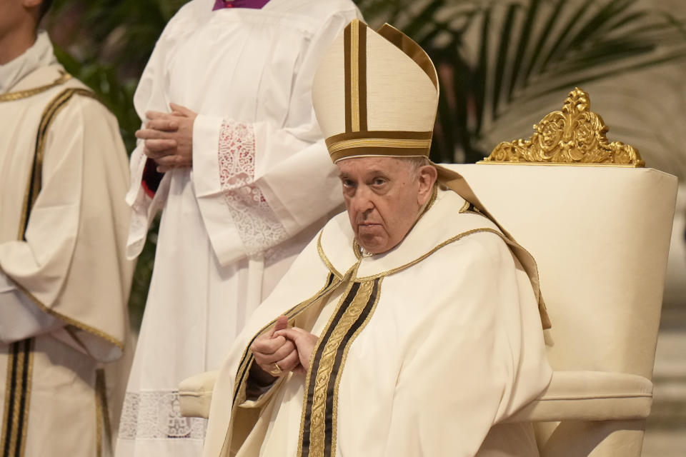 Pope Francis attends a mass in St. Peter's Basilica at the Vatican, Tuesday, Oct. 11, 2022. Pope Francis commemorates the 60th anniversary of the opening of the Second Vatican Council by celebrating a Mass in honor of St. John XXIII, the "good pope" who convened the landmark meetings that modernized the Catholic Church. (AP Photo/Alessandra Tarantino)