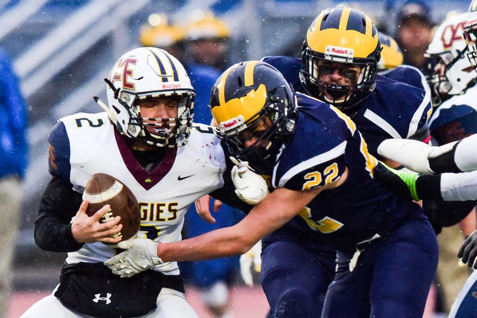 Tioga's Isaac Peterson sacks Oakfield-Alabama/Elba quarterback Bodie Hyde during the Class D state semifinal game on Friday, Nov. 26, 2021 at Cicero–North Syracuse High School.