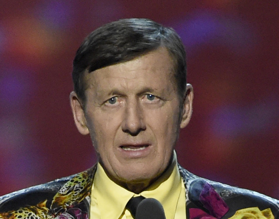 FILE - In this July 13, 2016, file photo, Craig Sager accepts the Jimmy V award for perseverance at the ESPY Awards at Microsoft Theater in Los Angeles. Sager, the longtime NBA sideline reporter famous for his flashy suits and probing questions, has died after a battle with cancer, Turner Sports announced Thursday, Dec. 15, 2016. He was 65. (Photo by Chris Pizzello/Invision/AP, File)