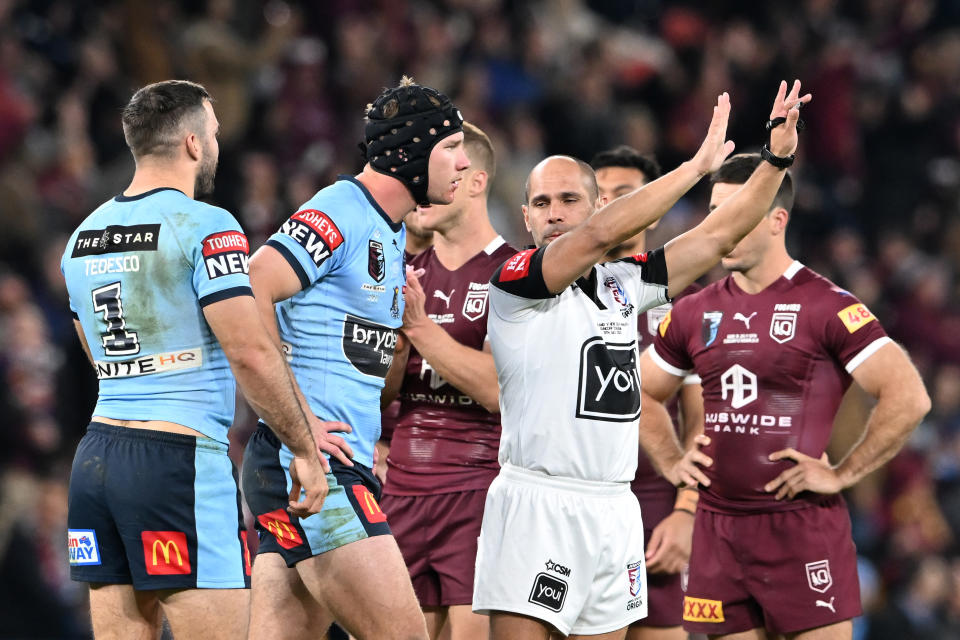 Matt Burton, pictured here leaving the field after being sin-binned in State of Origin III.