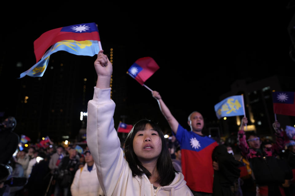 Kuomintang (KMT) party supporters react after their presidential candidate Hou Yu-ih conceded defeat in New Taipei City, Taiwan, Saturday, Jan. 13, 2024. In his concession speech, Hou apologized for "not working hard enough" to regain power for the KMT, which ran Taiwan under martial law for nearly four decades before democratic reforms in the 1980s. (AP Photo/Ng Han Guan)