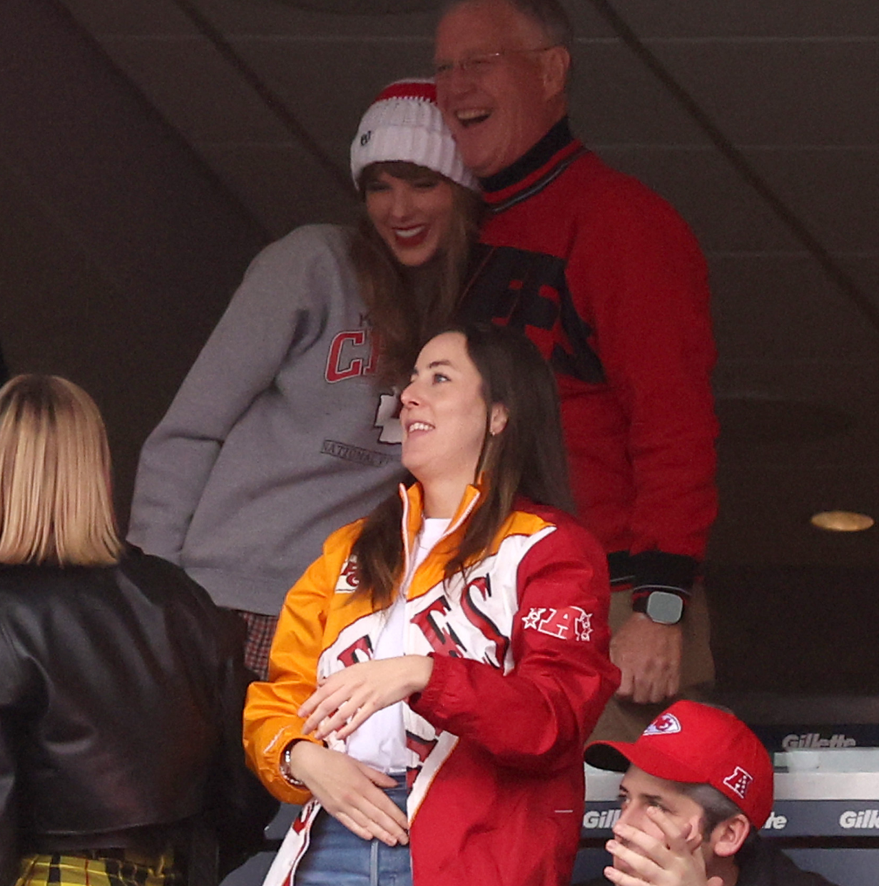  Brittany Mahomes looks on while Taylor Swift hugs Scott Kingsley Swift and Alana Haim cheers while the Kansas City Chiefs and the New England Patriots play at Gillette Stadium on December 17, 2023 in Foxborough, Massachusetts. 