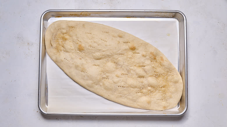 baked flatbread on baking sheet