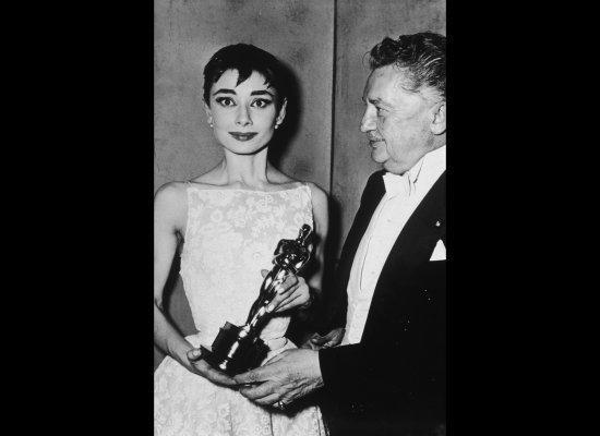 Audrey Hepburn's iconic lace gown that she wore at the 1954 Oscar's for her Roman Holiday nod, was <a href="http://www.vogue.co.uk/news/2011/11/03/audrey-hepburn-oscars-dress-auction" target="_hplink">sold at a private auction in London last week</a>. As expected, the dress fetched an insane amount of money...a whooping £84,000 (or the equivalent of $113,332) to be exact, as <em>British Vogue</em> reported. Experts had estimated the dress to sell between £40,000 - £60,000, (or $53,968-$80,952)so even the pros were stunned when it far surpassed the appraised figures. (Getty photo)