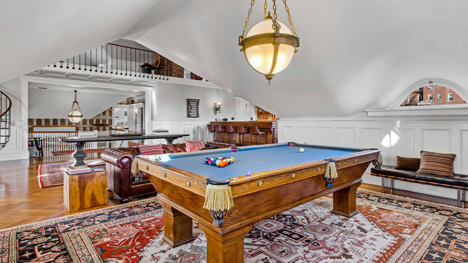 The former ballroom, now a billiards room and home theater.