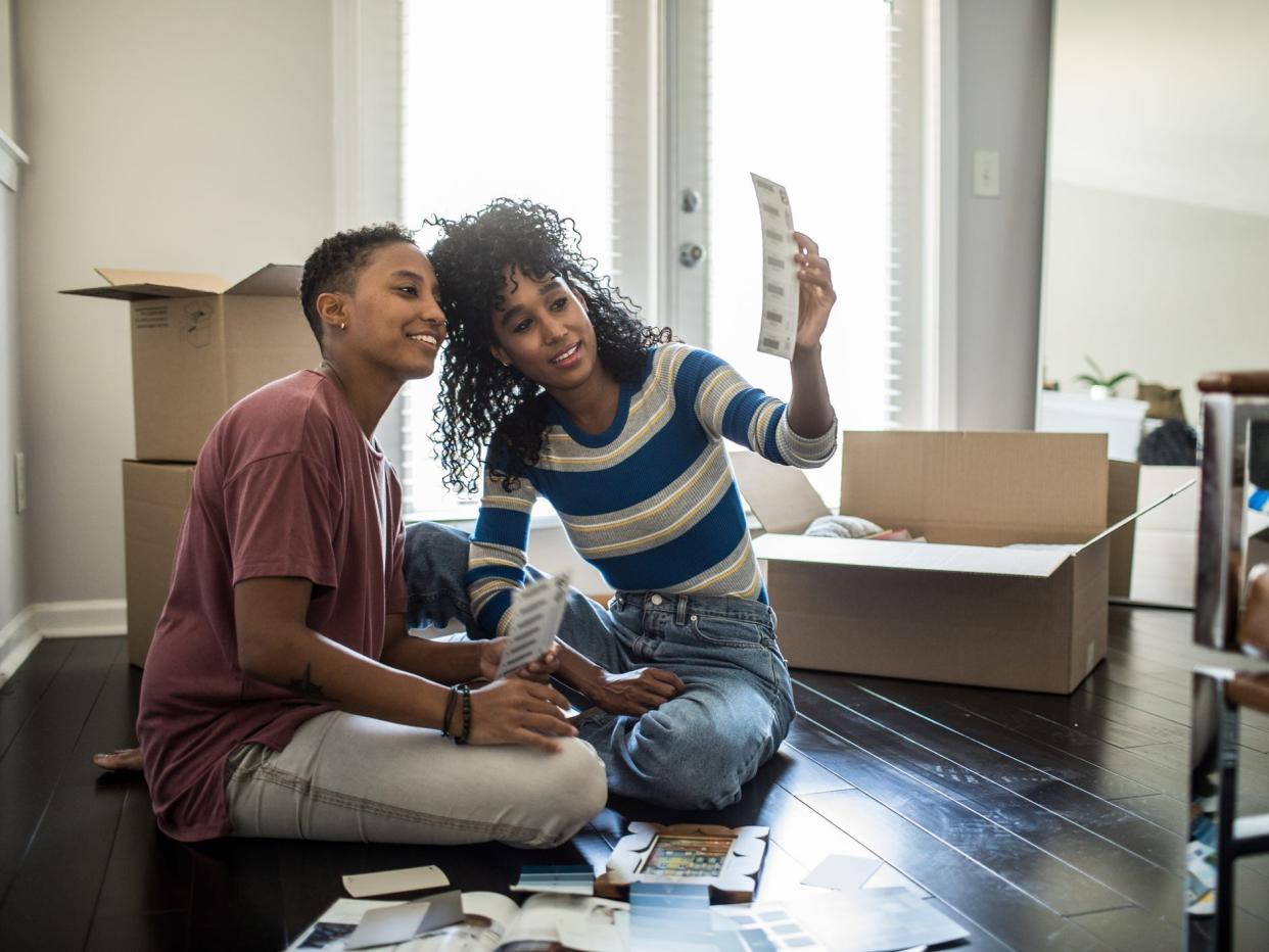 Queer couple moving in together