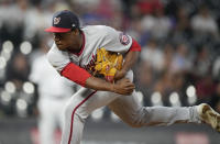 Washington Nationals starting pitcher Josiah Gray works against the Colorado Rockies in the first inning of a baseball game Monday, Sept. 27, 2021, in Denver. (AP Photo/David Zalubowski)