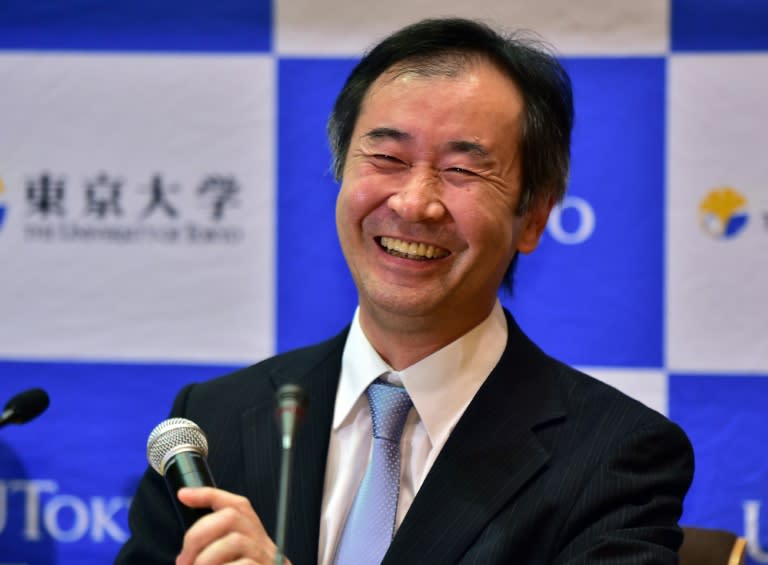 Takaaki Kajita smiles after it was announced he had won the Nobel Physics Prize, during a press conference at the University of Tokyo, on October 6, 2015