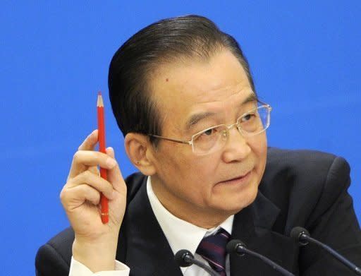 China's Premier Wen Jiabao has called for the break-up of a banking "monopoly" on lending that has squeezed private businesses as the global economy slows, state media reported