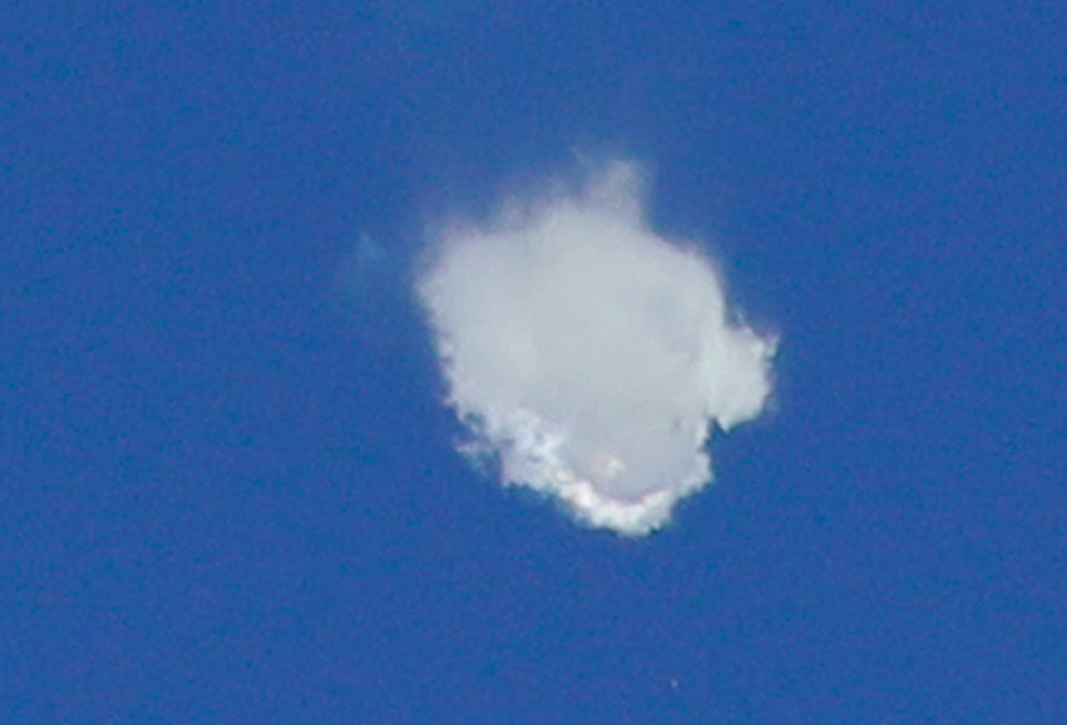 <em>Smoke rise as the boosters of first stage of the Soyuz-FG rocket with Soyuz MS-10 space ship carrying a new crew to the ISS separate after the launch (PA)</em>