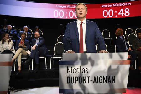 Nicolas Dupont-Aignan of Debout La France group arrives at the television studio where the eleven candidates will attend a prime-time televised debate for the French 2017 presidential election in La Plaine Saint-Denis, near Paris, France, April 4, 2017. REUTERS/Lionel Bonaventure/Pool