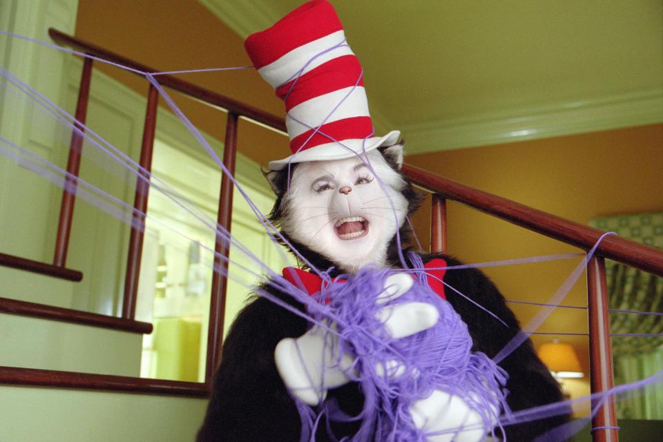 Mike Myers is entangled in yarn while playing Dr. Seuss' Cat in the Hat