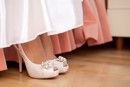 Look slimmer on your wedding day by wearing heels