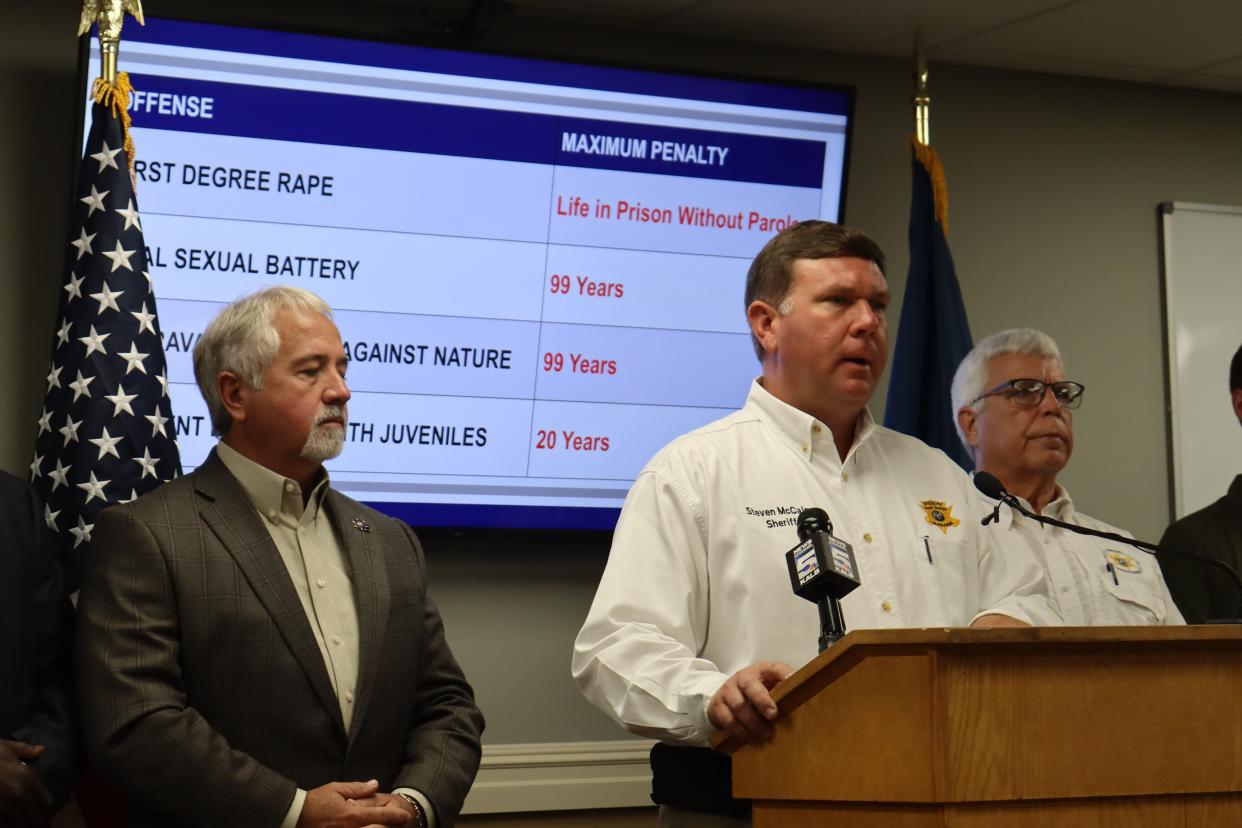 Grant Parish Sheriff Steven McCain talks about the arrest of Daryl Ray Stagg during a press conference while standing with Rapides Sheriff Mark Wood (left) and Union Parish Sheriff Dusty Gates (right).