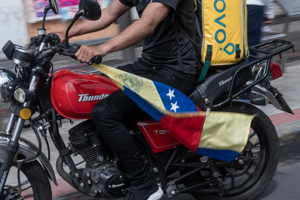 Nearly 70% of the delivery drivers in Ecuador are migrants primarily from Venezuela. Many say that they are victims of xenophobic treatment at work.<span class="copyright">Isadora Romero—Magnum Foundation</span>